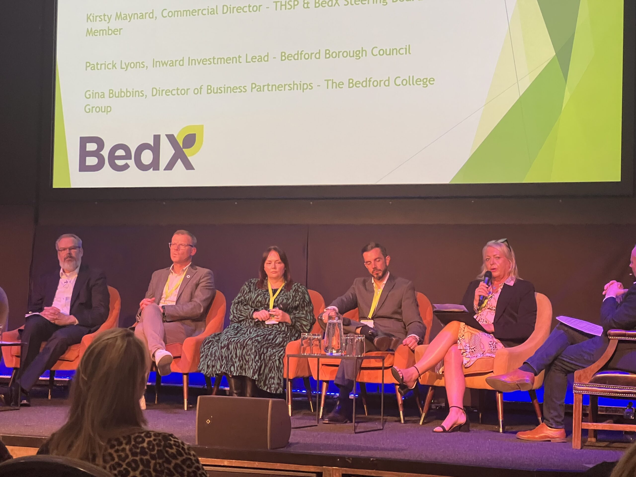 Members of the BedX panel taking audience questions.
